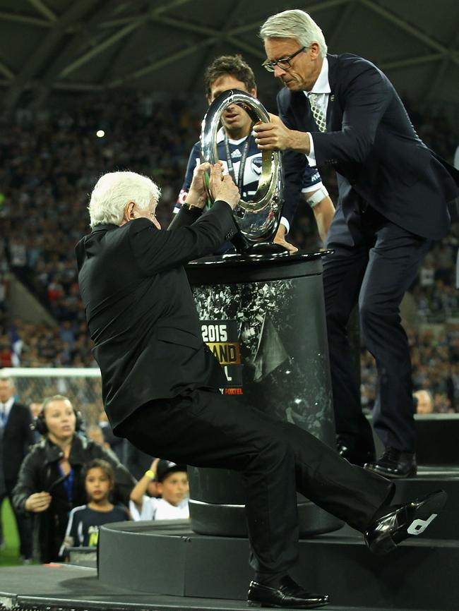 Slip ... FFA chairman Frank Lowy loses balance ...