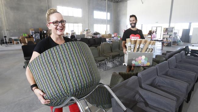 Yasmin Grigaliunas and Wassim Sayegh at the World’s Biggest Garage Sale at the Rivermakers business park. Picture: AAP Image/Claudia Baxter