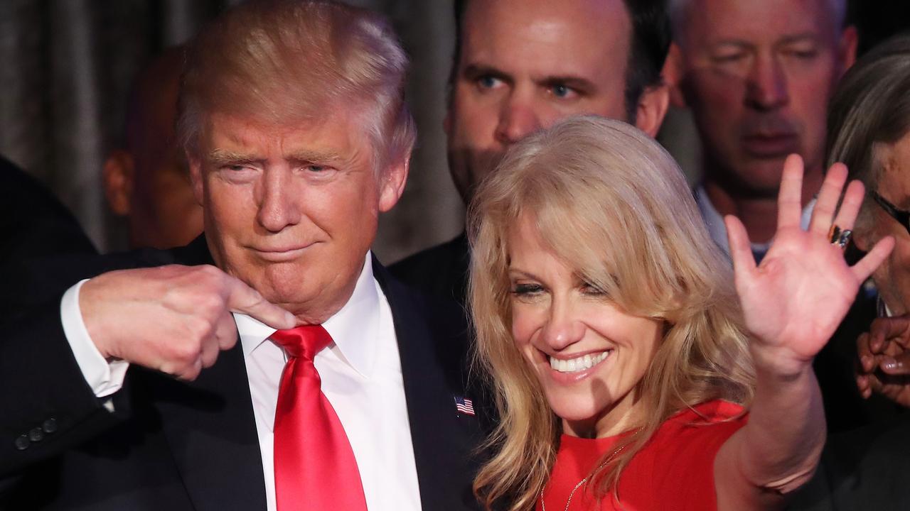 President-elect Donald Trump and his campaign manager Kellyanne Conway acknowledge the crowd during his election night event at the New York Hilton Midtown in NYC, on November 9, 2016, after Trump defeated Democratic presidential nominee Hillary Clinton to become the 45th president of the United States. Picture: AFP