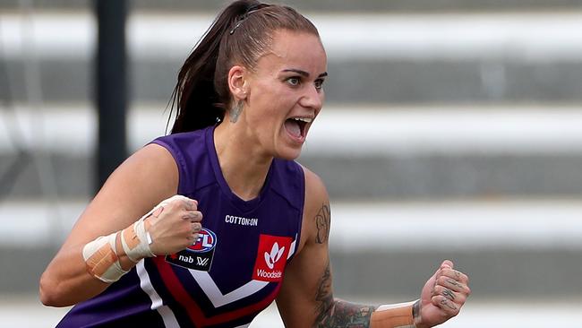 Gemma Houghton gets up and about after a goal during the Dockers smashing of the Suns. Picture: AAP