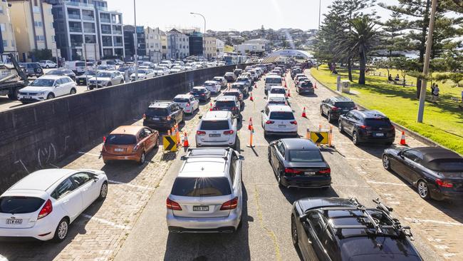 Long lines of cars are seen at the Covid testing clinic at Bondi this morning. Picture: Jenny Evans/Getty Images