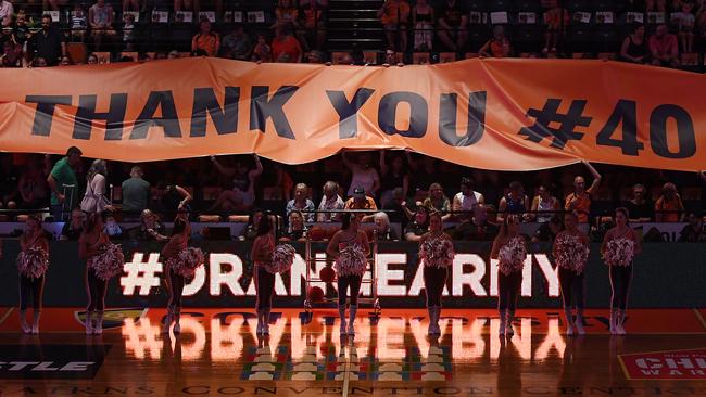 CAIRNS, AUSTRALIA — FEBRUARY 09: A banner is unfurled to commemorate Alex Loughton's last ever home game before his retirement during the round 17 NBL match between the Cairns Taipans and the Brisbane Bullets at Cairns Convention Centre on February 09, 2019 in Cairns, Australia. (Photo by Ian Hitchcock/Getty Images)