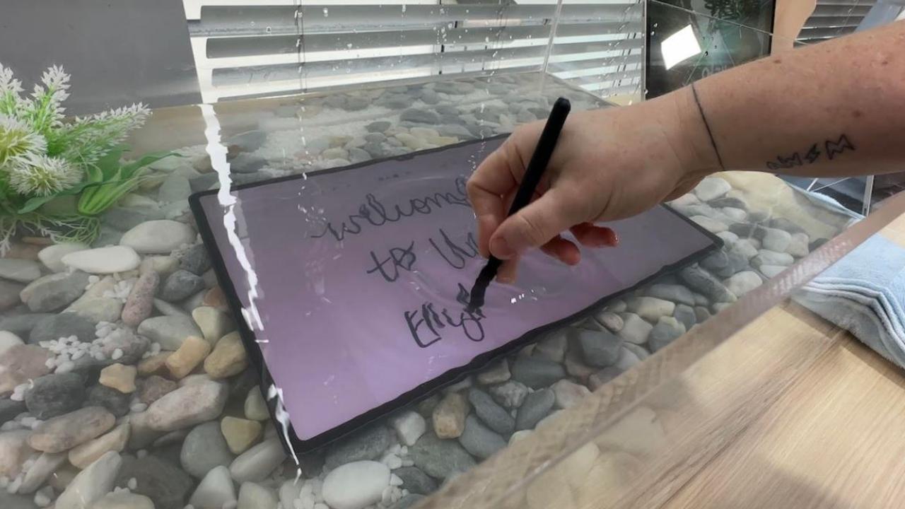 ‘You can even write on the tablet under water’. Picture: Elly Awesome