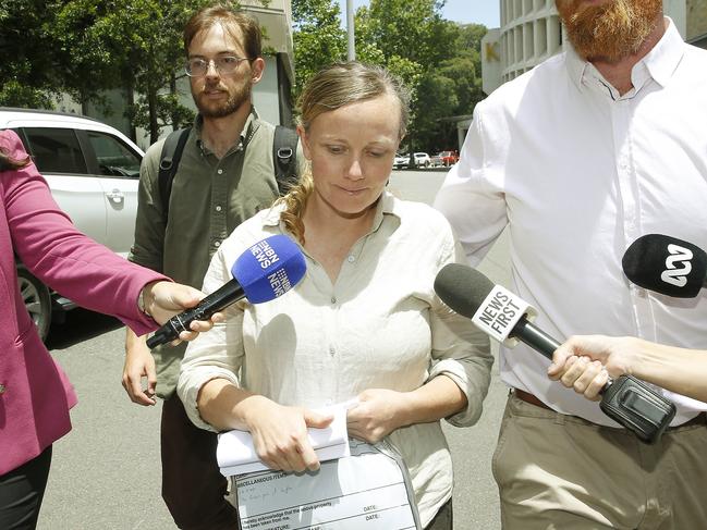 Naomi Hodgson joined by supporters and surrounded by media as she walks free on bail from Newcastle Local Court. Picture: John Appleyard