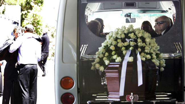 Ricky Nixon at the funeral of Clinton Grybas.
