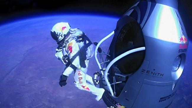 TOPSHOTS This picture provided by www.redbullcontentpool.com shows pilot Felix Baumgartner of Austria jumping out of the capsule during the final manned flight for Red Bull Stratos on 14 Oct 2012. The Austrian daredevil became the first man to break the sound barrier in a record-shattering freefall jump from the edge of space, organizers said. The 43-year-old leapt from a capsule more than 24 miles (39 kilometers) above the Earth, reaching a speed of 706 miles per hour (1,135 km/h) before opening his red and white parachute and floating down to the New Mexico desert. AFP PHOTO/www.redbullcontentpool.com/Jay Nemeth/HO RESTRICTED TO EDITORIAL USE - MANDATORY CREDIT &AFP PHOTO / www.redbullcontentpool.com / Jay Nemeth& - NO MARKETING NO ADVERTISING CAMPAIGNS - DISTRIBUTED AS A SERVICE TO CLIENTS = ONE-TIME PUBLICATION = IMAGE MUST NOT BE ALTERED OR MODIFIED