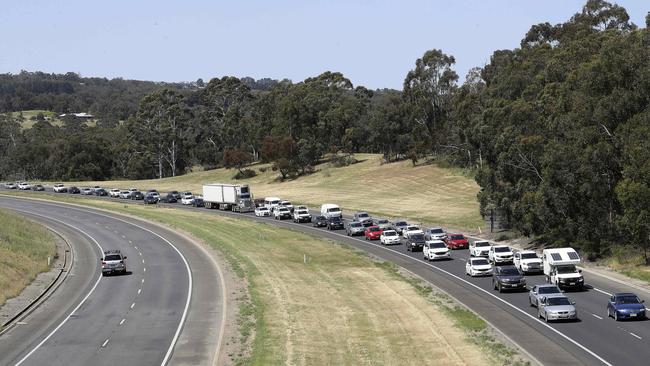 The traffic is banked up on the South-Eastern Freeway, even after the truck was moved all the way off the road. Picture: Sarah Reed