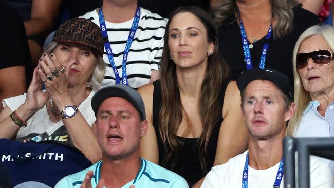 Lleyton and Bec Hewitt watch sone Cruz in action. Photo: Mark Stewart