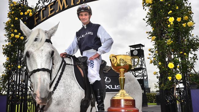 Melbourne Cup winning jockey Corey Brown on a horse in the Flemington archways