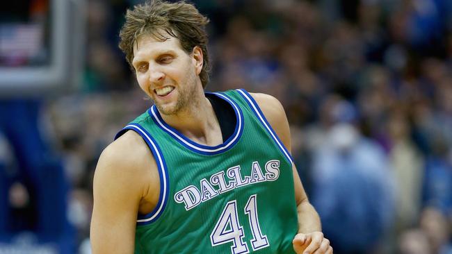 Dirk Nowitzki of the Dallas Mavericks reacts after scoring against the Milwaukee Bucks in the second half at American Airlines Center.