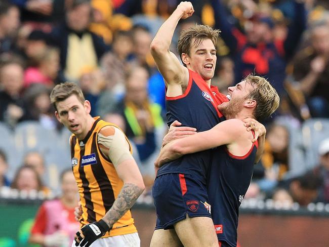 Dom Tyson and Jack Watts celebrate the Dees’ win over Hawthorn. Picture: Wayne Ludbey