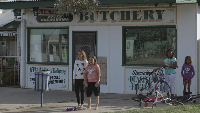 Young choristers hang out in Brewarrina in a scene from Wide Open Sky.