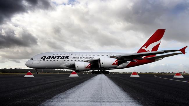 A Qantas A380 makes it way to the runway for takeoff at Melbourne’s Tullamarine Airport. The airline today announced the sale of its Melbourne Airport terminal for $355m. Picture: Nicole Garmston