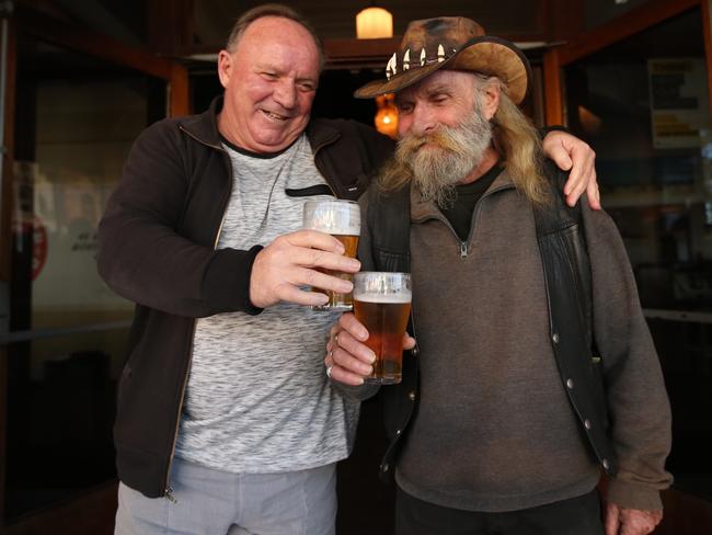 George Froggett and Roman Pearce are not happy with having to drink somewhere else when the pub will have to close down next week. Picture: Adam Taylor