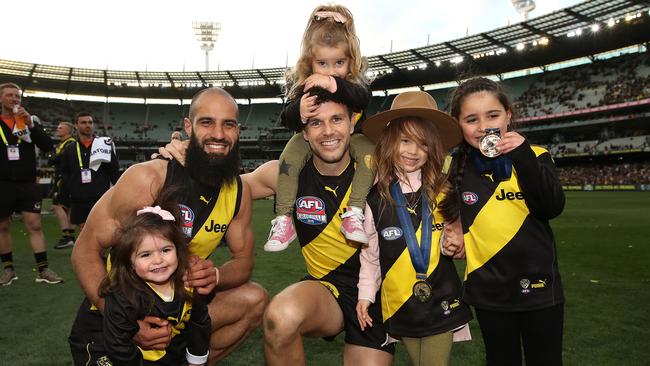 Bachar Houli and Trent Cotchin celebrate with family after the Tigers Grand Final win. Picture: Phil Hillyard