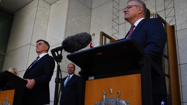 Prime Minister Scott Morrison and Treasurer Josh Frydenberg address the media. Picture: Getty Images.