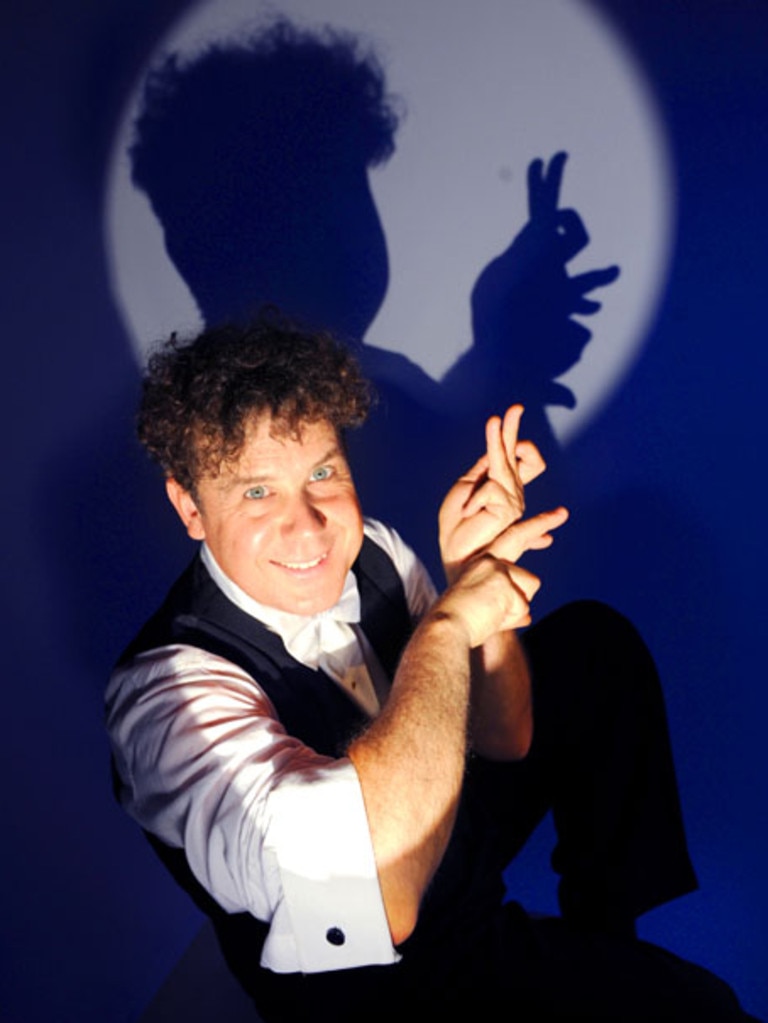 Unusualist Raymond Crowe displays his hand shadow puppetry magician skills. He will perform as part of the 10th Adelaide Cabaret Festival.