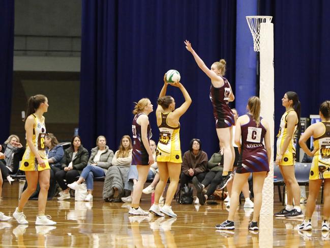 Cripps GK Alex Vinen defends Hawks GA Kendell Jones in Saturday's TNL Preliminary Final. Picture: Jess Stevenson.