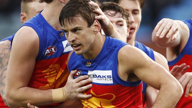 ADELAIDE, AUSTRALIA - JULY 14: Jarryd Lyons of the Lions (3rd L) celebrates a goal during the round 16 AFL match between the Port Adelaide Power and the Brisbane Lions at Adelaide Oval on July 14, 2019 in Adelaide, Australia. (Photo by Daniel Pockett/Getty Images)