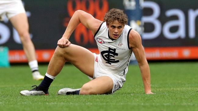 Charlie Curnow injured his knee playing basketball.