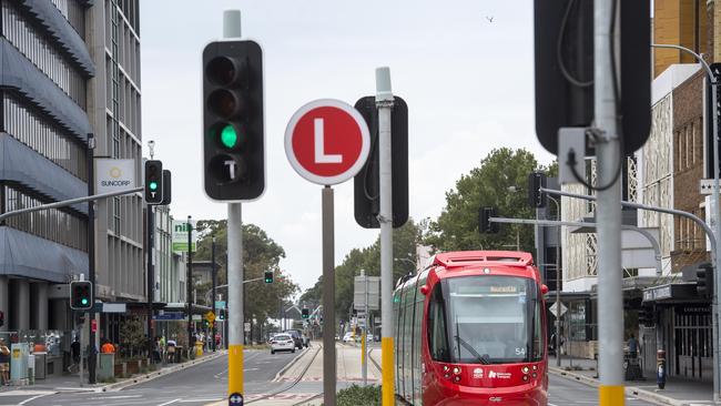 Woman issued a $1000 PIN for mooning light rail in Hunter street. AAP image Troy Snook.