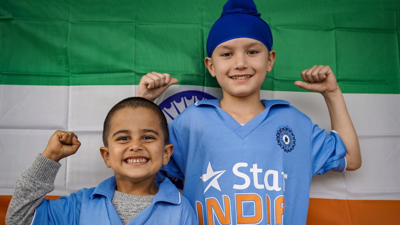 Rudr Bahl, 4, and Dharman Singh, 6, are looking forward to the women's international cricket match between Australia and India at the Great Barrier Reef Arena. Picture: Heidi Petith