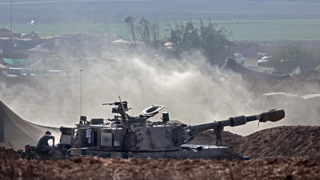 An Israeli artillery crew prepare to fire from a field near the Israeli city of Sderot toward the Gaza Strip, On October 23, 2023, amid ongoing battles between Israel and the Palestinian group Hamas. Picture: Thomas Coex/AFP