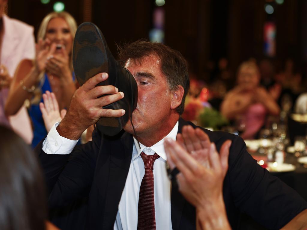 Starcevich made good on his promise to do a shoey if Bates won. Picture: AFL Photos/Getty Images