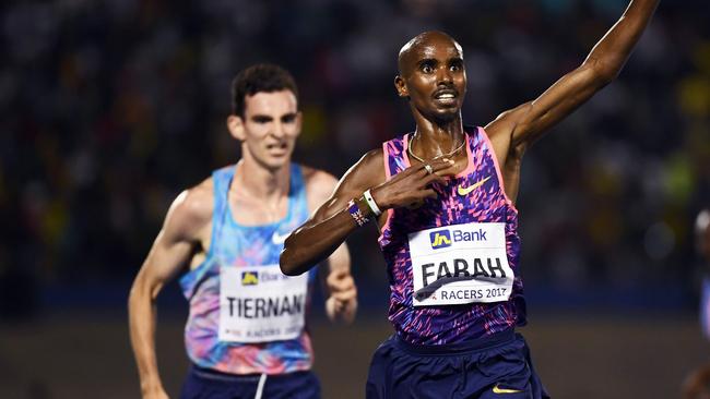 Patrick Tiernan chases home Olympic 5000m and 10,000m champion Mo Farah in the 3000m at the Racers Grand Prix in Jamaica last month.