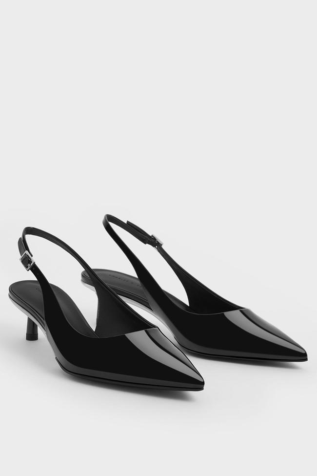 Charles & KeithPatent Pointed-Toe Kitten-Heel Slingback PumpsThe fashion directors here at the Vogue office are passionate advocates for wearing slingback kitten heels at the office in all seasons. In summer though, that choice becomes even more appropriate when we put our boots and loafers away. Start your season’s collection with this faux leather pair from Charles & Keith.Type: Kitten heels | Material: Patent faux leather | Colour: Brown, cream, silver | Delivery: Free over $130Shop now for $103