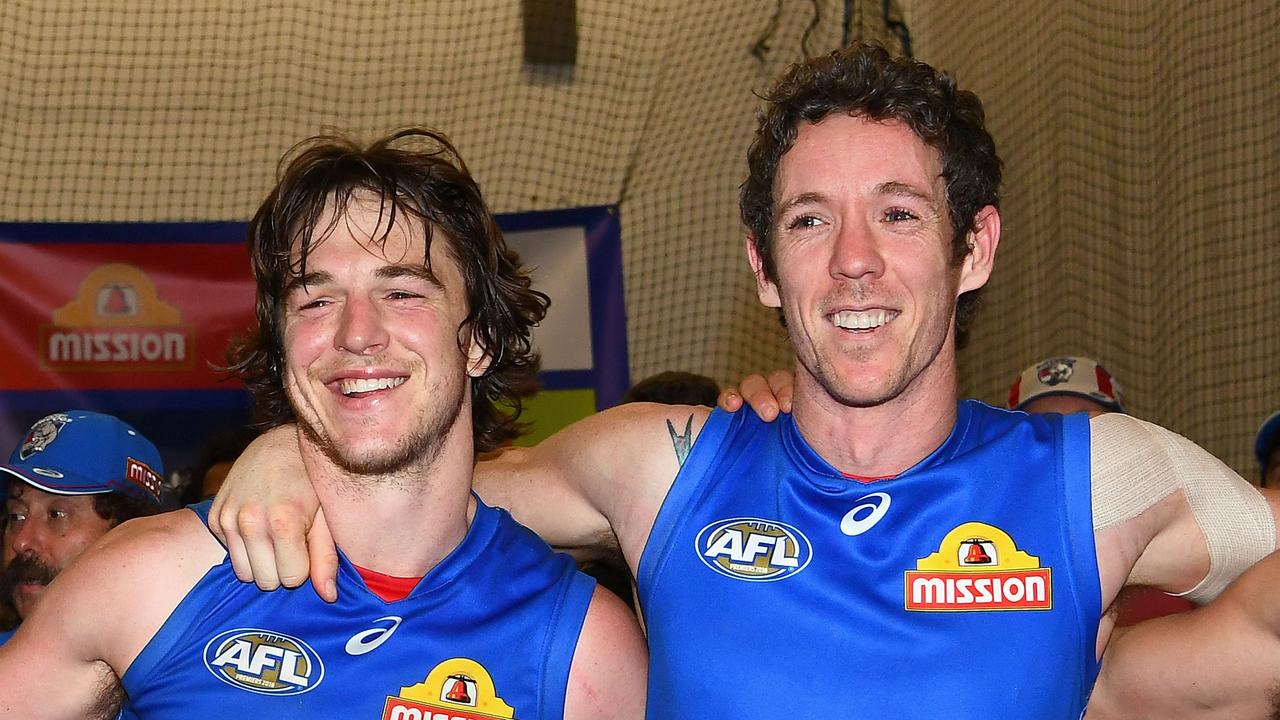 Liam Picken and Bob Murphy sing the song after a Western Bulldogs win. Photo: Quinn Rooney/Getty Images.