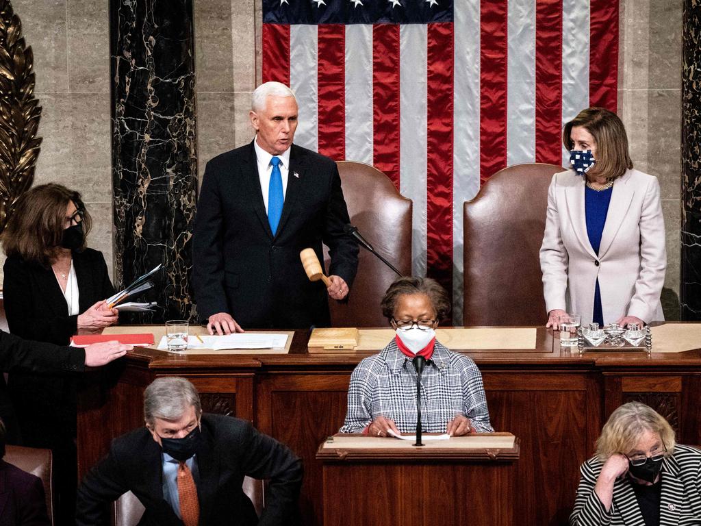 Vice President Mike Pence and House Speaker Nancy Pelosi preside over a Joint session of Congress to certify the 2020 Electoral College results after the siege. Picture: Erin Schaff /AFP