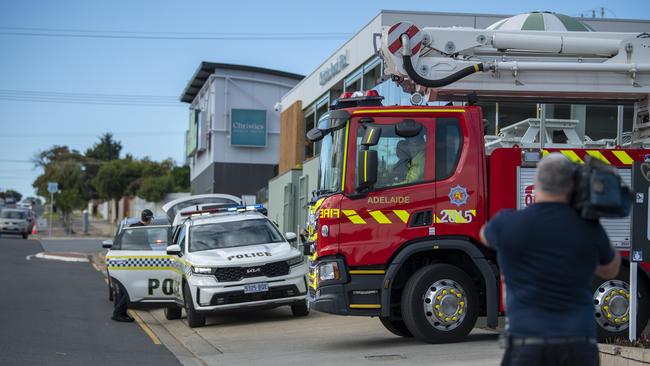 The MFS leaves the scene after the man was brought down and arrested. Picture: Mark Brake