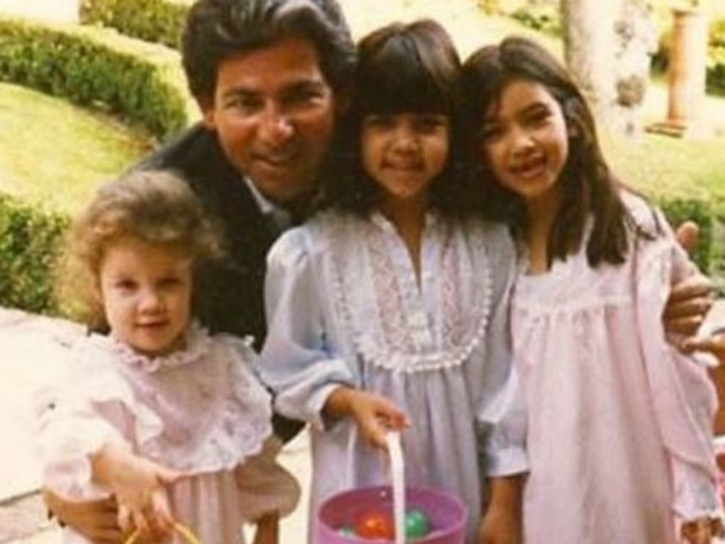 Robert Kardashian with his daughters, Khloe, Kourtney and Kim.