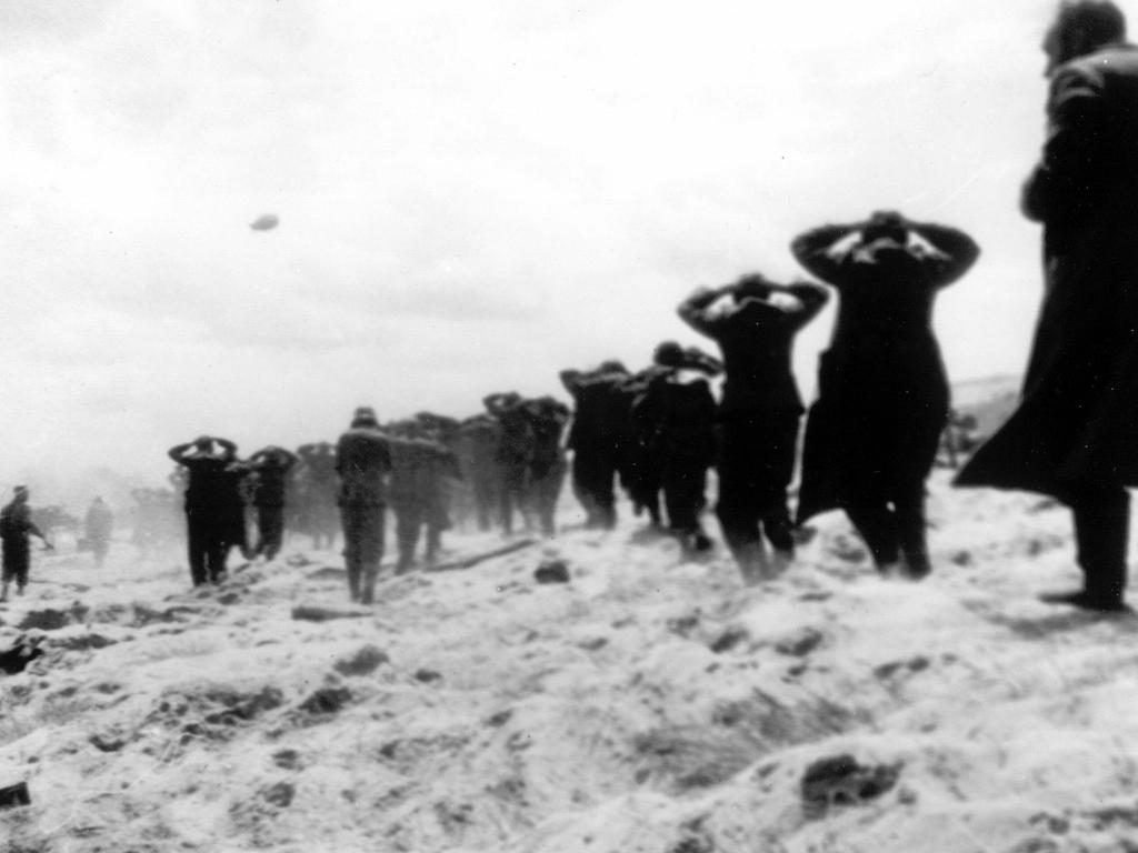 German aggression finally checked … enemy prisoners are led away at Utah Beach on June 6, 1944. Many historians see D-Day as the beginning of the end of the Second World War.