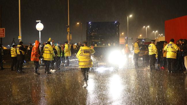 Police direct truck drivers queued at Kent as the Port of Dover remains closed. Picture: Getty Images