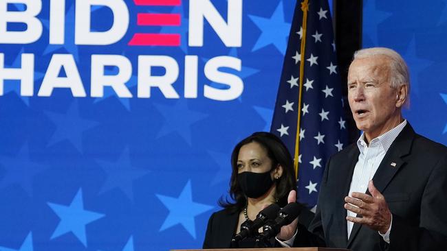 Joe Biden gives an address in Wilmington, Delaware, as Kamala Harris listens. Picture; AFP.