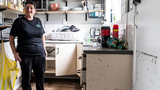 News  Courier Mail Hervey Bay 12.3.2024. Cleanup continues in Hervey Bay Narelle Arthur in the kitchin of her home, marks show the water was waist high.  Photo Paul Beutel