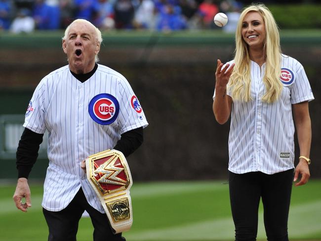 Ric Flair with daughter and fellow wrestler Charlotte at a Chicago Cubs game. (Photo: David Banks/Getty Images/AFP)