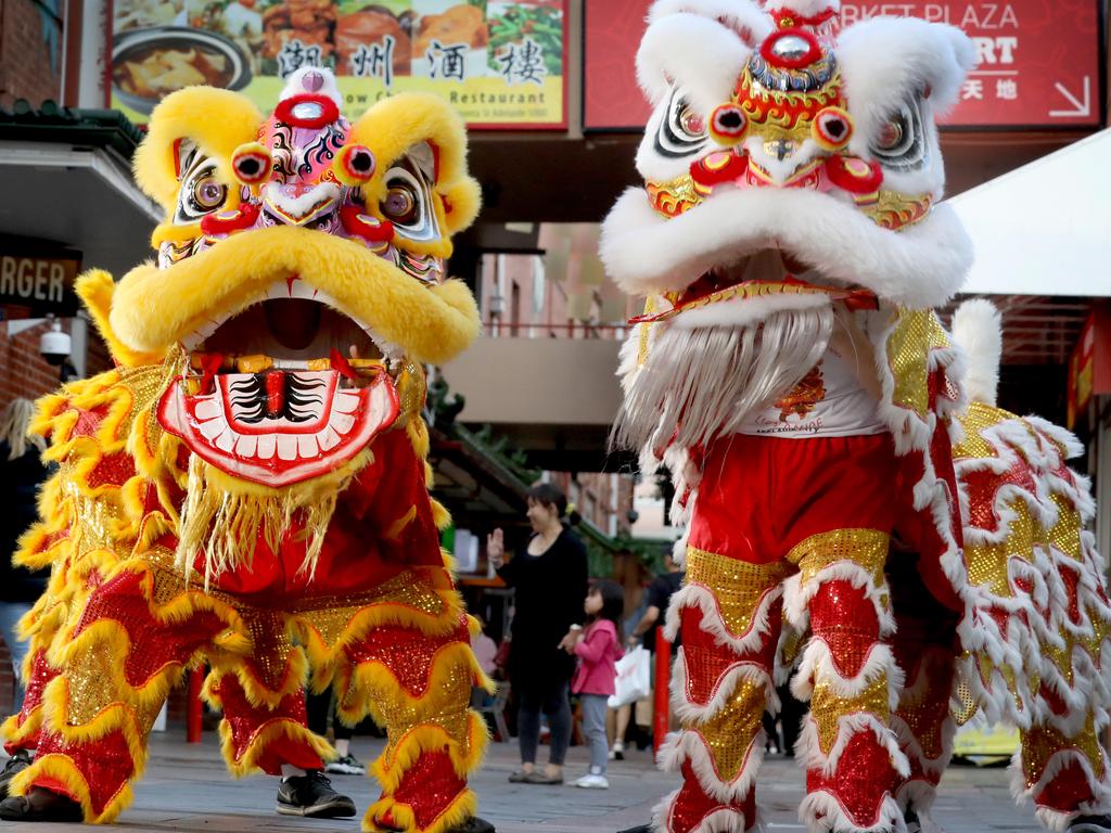 ItÃ•s the year of the Ox and with the Chinese New Year approaching, Lion Dancers are doing their thing in Chinatown. 5 February 2021. Picture Dean Martin

Dancers - Raymond Nguyen (guy on right with Lion head), Long Taing (guy with glasses with lion head), Dung Huynh (ail on left ) and Dean Coleman (tail on right )