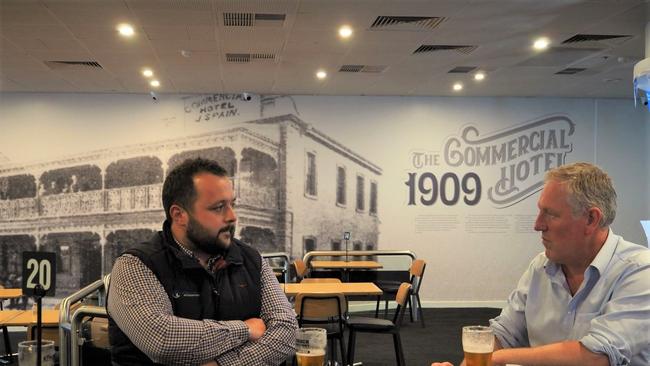 Mount Gambier accountant Josh Lewis and Troy Bell (right) at the regional city’s The Commercial Hotel. Picture: Kate Hill