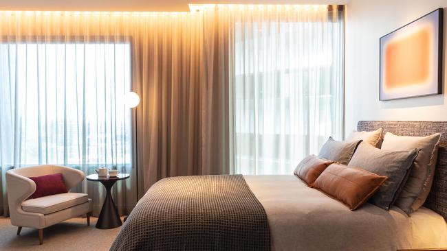 The Next Level Room boasts a king-size bed with French linen bedding.