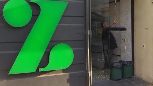 The same man has also been accused of damaging a shop window. Picture: 7NEWS