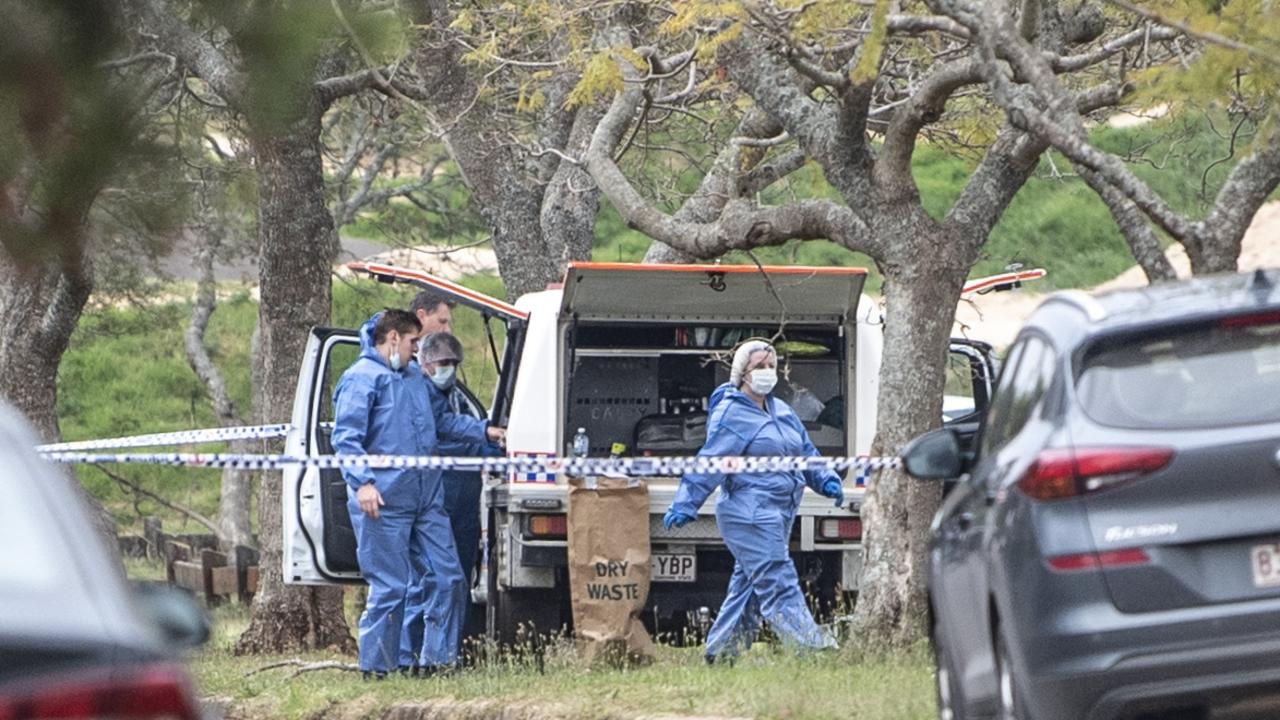 Forensic police and detectives investigate the scene of a death in custody in Stone St at Wilsonton. Picture: Nev Madsen