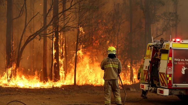 Firefighters battling blazes near Taree at the weekend. Picture: Nathan Edwards.