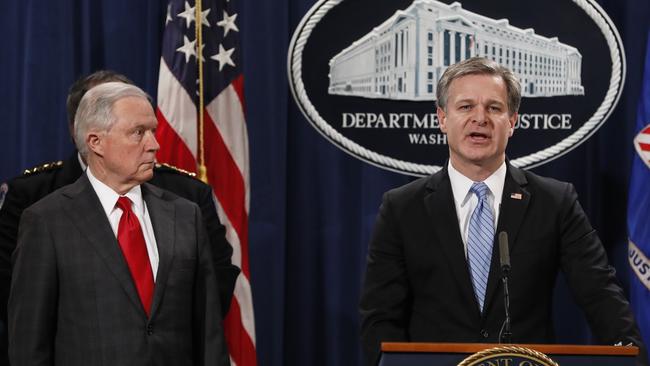 FBI Director Christopher Wray, accompanied by Attorney-General Jeff Sessions, speaks at a press conference about the apprehension of the suspect. Picture: AFP