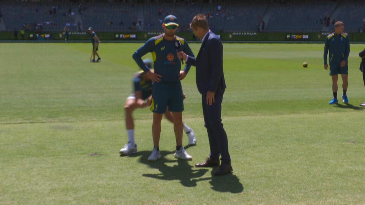 Fast bowler Mitchell Starc pulls Nathan Lyon's pants down during an interview ahead of day three.
