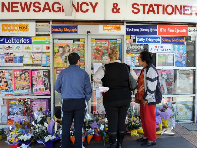 Tributes to the slain Lin family outside the Epping newsagency run by Mr Lin.