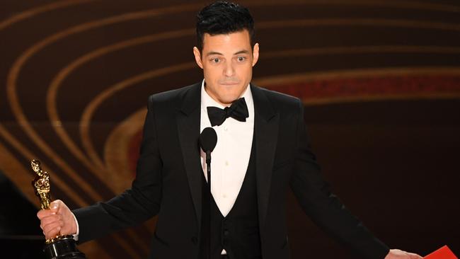 Rami Malek accepts the award for Best Actor. Picture: AFP