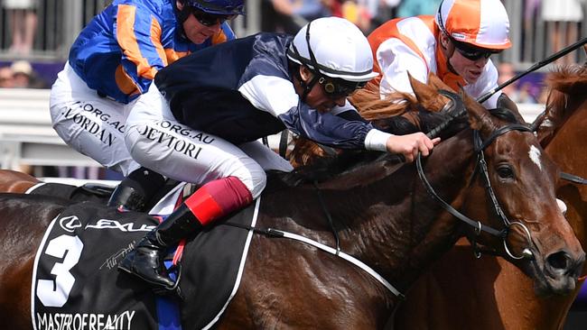 Jockey Craig Williams rides Vow And Declare to victory from Frankie Dettori riding Master Of Reality and Wayne Lordan riding Il Paradiso in race 7, the Lexus Melbourne Cup,  during Melbourne Cup Day, at Flemington Racecourse in Melbourne, Tuesday, November 5, 2019. (AAP Image/Vince Caligiuri) NO ARCHIVING, EDITORIAL USE ONLY